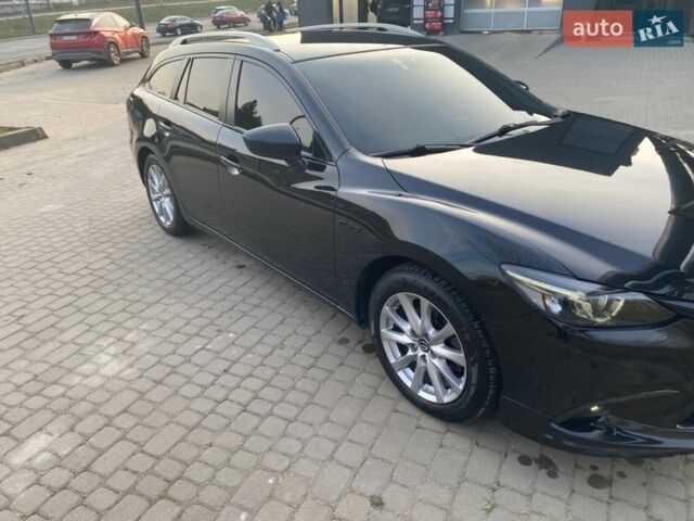 Черный Мазда 6, объемом двигателя 2.19 л и пробегом 246 тыс. км за 14000 $, фото 2 на Automoto.ua