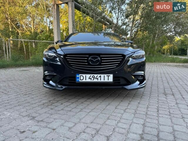 Черный Мазда 6, объемом двигателя 2.19 л и пробегом 248 тыс. км за 13900 $, фото 1 на Automoto.ua