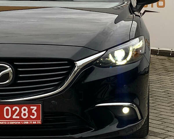 Чорний Мазда 6, об'ємом двигуна 2.2 л та пробігом 175 тис. км за 14900 $, фото 3 на Automoto.ua