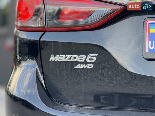 Черный Мазда 6, объемом двигателя 2.2 л и пробегом 178 тыс. км за 19450 $, фото 12 на Automoto.ua
