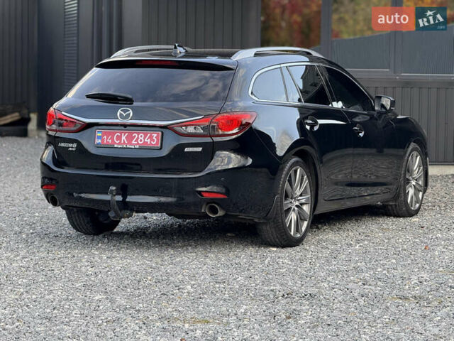 Черный Мазда 6, объемом двигателя 2.2 л и пробегом 178 тыс. км за 19450 $, фото 11 на Automoto.ua