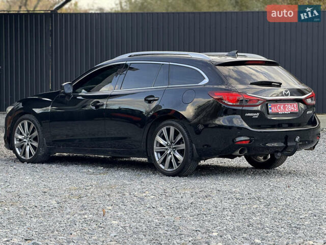 Черный Мазда 6, объемом двигателя 2.2 л и пробегом 178 тыс. км за 19450 $, фото 9 на Automoto.ua