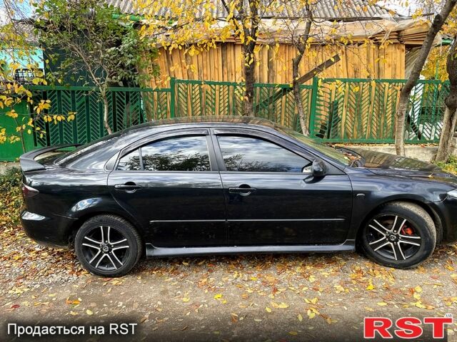 Чорний Мазда 6, об'ємом двигуна 1.8 л та пробігом 350 тис. км за 1450 $, фото 3 на Automoto.ua