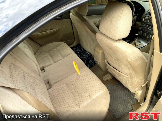 Чорний Мазда 6, об'ємом двигуна 1.8 л та пробігом 350 тис. км за 1450 $, фото 5 на Automoto.ua