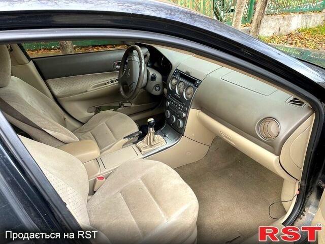 Чорний Мазда 6, об'ємом двигуна 1.8 л та пробігом 350 тис. км за 1450 $, фото 4 на Automoto.ua