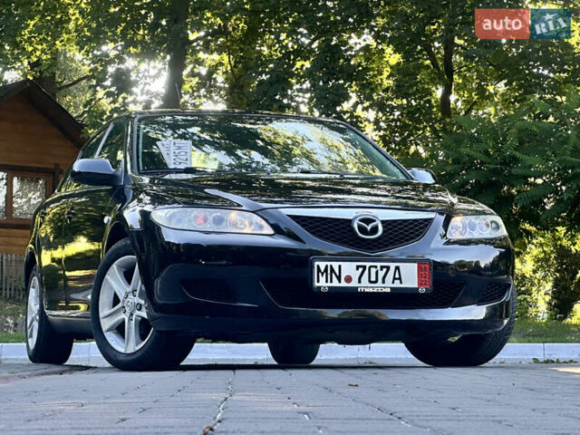 Черный Мазда 6, объемом двигателя 1.8 л и пробегом 230 тыс. км за 3999 $, фото 4 на Automoto.ua