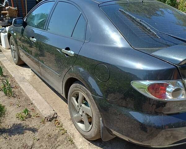 Черный Мазда 6, объемом двигателя 2 л и пробегом 388 тыс. км за 3800 $, фото 2 на Automoto.ua