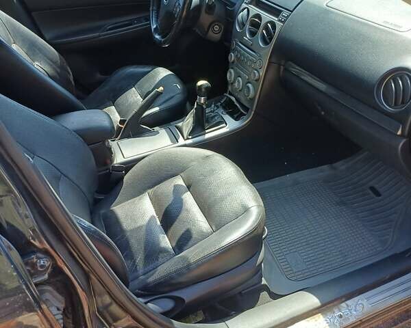 Черный Мазда 6, объемом двигателя 2 л и пробегом 388 тыс. км за 3800 $, фото 4 на Automoto.ua