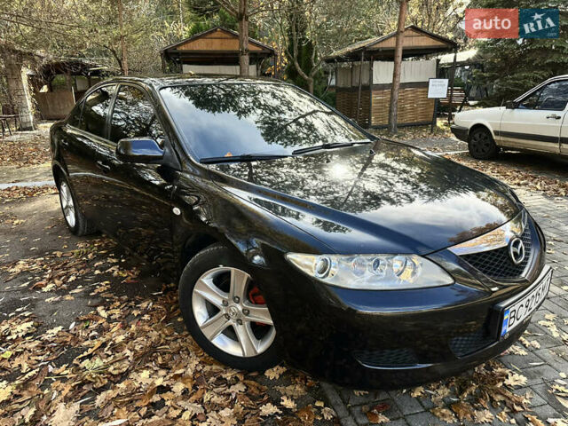 Черный Мазда 6, объемом двигателя 1.8 л и пробегом 230 тыс. км за 3650 $, фото 2 на Automoto.ua