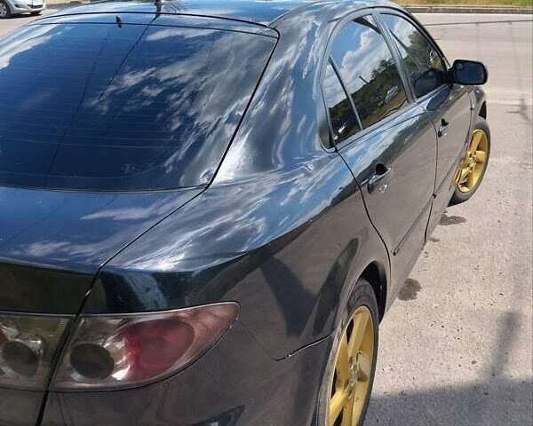 Чорний Мазда 6, об'ємом двигуна 2 л та пробігом 316 тис. км за 4700 $, фото 1 на Automoto.ua