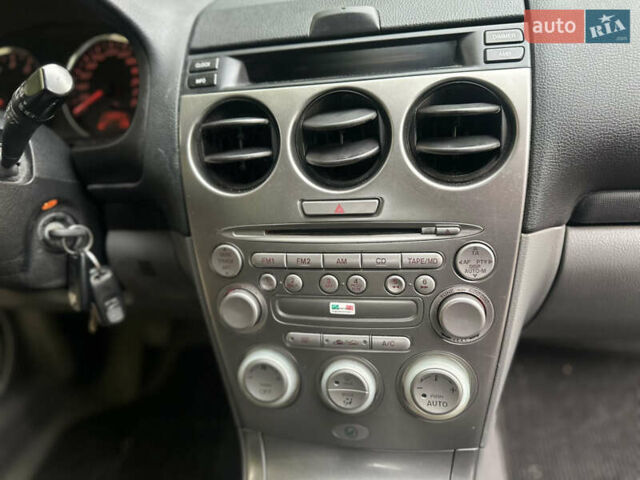 Черный Мазда 6, объемом двигателя 1.8 л и пробегом 230 тыс. км за 3650 $, фото 41 на Automoto.ua