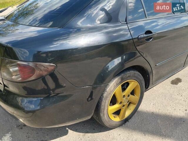 Чорний Мазда 6, об'ємом двигуна 2 л та пробігом 316 тис. км за 4700 $, фото 2 на Automoto.ua