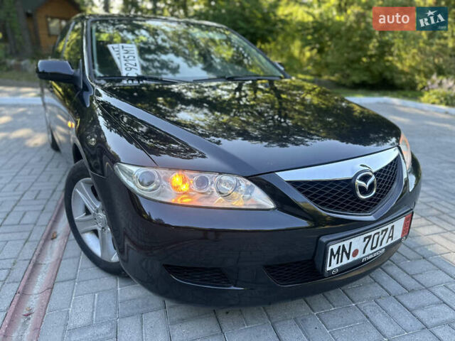 Черный Мазда 6, объемом двигателя 1.8 л и пробегом 230 тыс. км за 3999 $, фото 10 на Automoto.ua