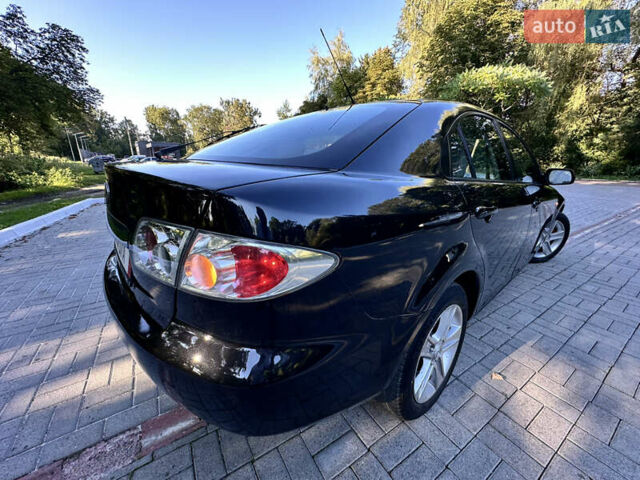 Черный Мазда 6, объемом двигателя 1.8 л и пробегом 230 тыс. км за 3999 $, фото 34 на Automoto.ua
