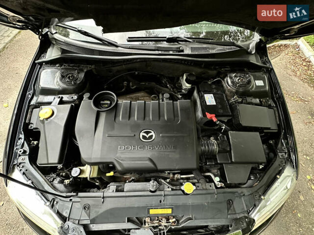 Черный Мазда 6, объемом двигателя 1.8 л и пробегом 230 тыс. км за 3650 $, фото 39 на Automoto.ua