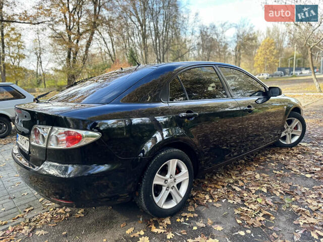 Черный Мазда 6, объемом двигателя 1.8 л и пробегом 230 тыс. км за 3650 $, фото 9 на Automoto.ua