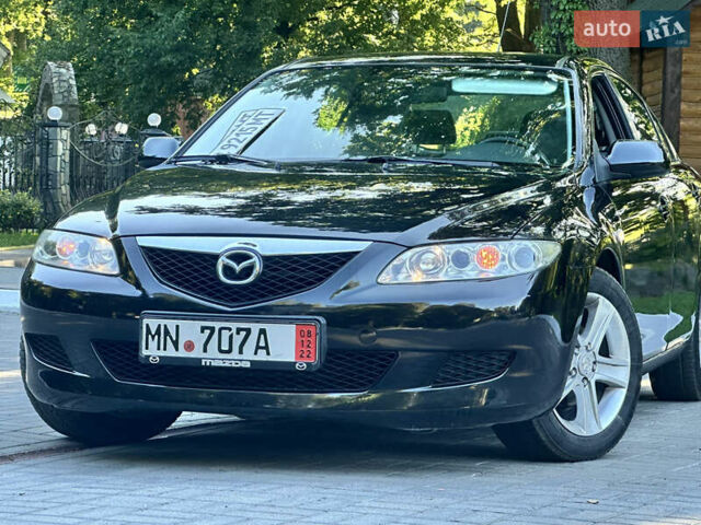 Черный Мазда 6, объемом двигателя 1.8 л и пробегом 230 тыс. км за 3999 $, фото 18 на Automoto.ua