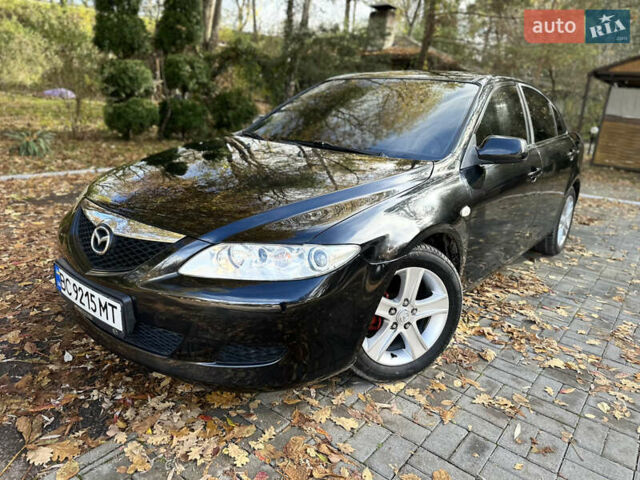 Черный Мазда 6, объемом двигателя 1.8 л и пробегом 230 тыс. км за 3650 $, фото 26 на Automoto.ua