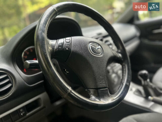 Черный Мазда 6, объемом двигателя 1.8 л и пробегом 230 тыс. км за 3650 $, фото 44 на Automoto.ua