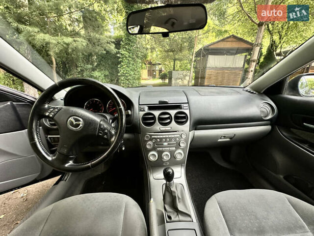 Черный Мазда 6, объемом двигателя 1.8 л и пробегом 230 тыс. км за 3650 $, фото 31 на Automoto.ua