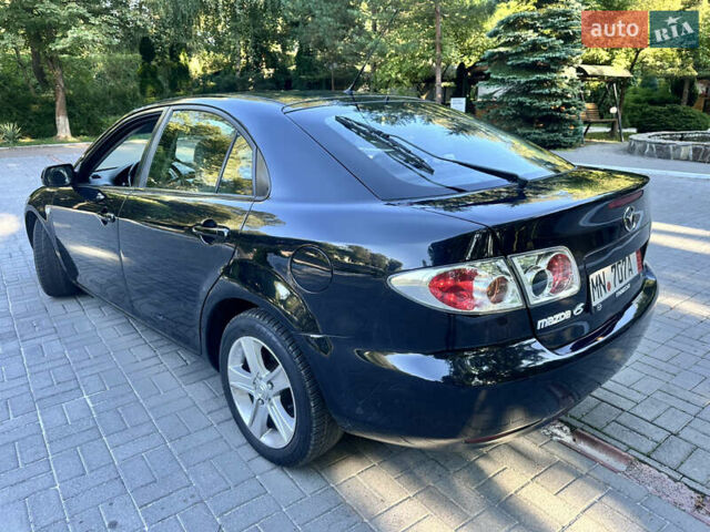 Черный Мазда 6, объемом двигателя 1.8 л и пробегом 230 тыс. км за 3999 $, фото 41 на Automoto.ua