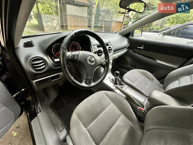 Черный Мазда 6, объемом двигателя 1.8 л и пробегом 230 тыс. км за 3999 $, фото 82 на Automoto.ua
