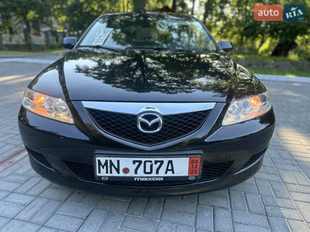 Черный Мазда 6, объемом двигателя 1.8 л и пробегом 230 тыс. км за 3999 $, фото 6 на Automoto.ua