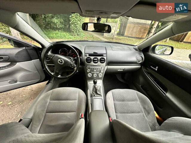 Черный Мазда 6, объемом двигателя 1.8 л и пробегом 230 тыс. км за 3650 $, фото 32 на Automoto.ua