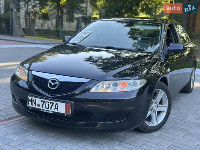 Черный Мазда 6, объемом двигателя 1.8 л и пробегом 230 тыс. км за 3999 $, фото 22 на Automoto.ua