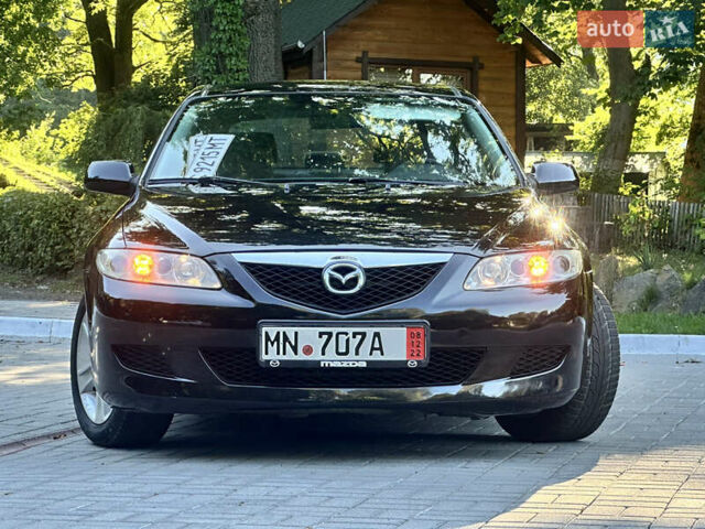 Черный Мазда 6, объемом двигателя 1.8 л и пробегом 230 тыс. км за 3999 $, фото 2 на Automoto.ua