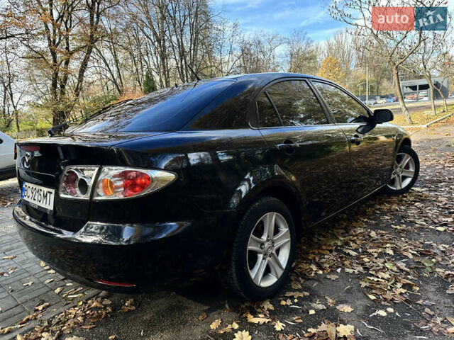 Черный Мазда 6, объемом двигателя 1.8 л и пробегом 230 тыс. км за 3650 $, фото 7 на Automoto.ua