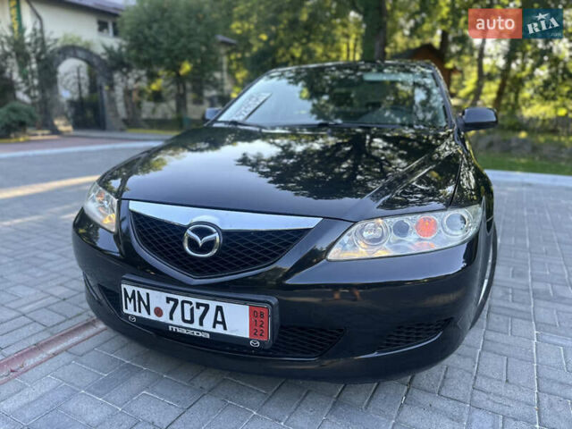 Черный Мазда 6, объемом двигателя 1.8 л и пробегом 230 тыс. км за 3999 $, фото 24 на Automoto.ua