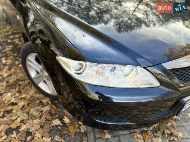 Черный Мазда 6, объемом двигателя 1.8 л и пробегом 230 тыс. км за 3650 $, фото 17 на Automoto.ua