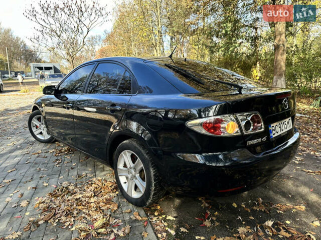 Черный Мазда 6, объемом двигателя 1.8 л и пробегом 230 тыс. км за 3650 $, фото 15 на Automoto.ua
