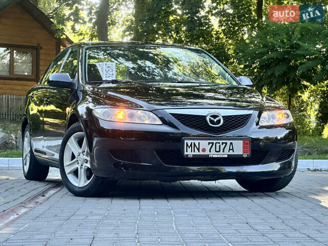 Черный Мазда 6, объемом двигателя 1.8 л и пробегом 230 тыс. км за 3999 $, фото 3 на Automoto.ua