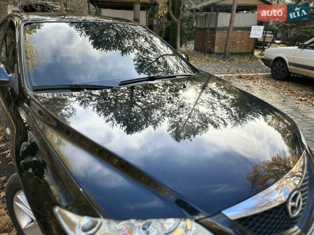 Черный Мазда 6, объемом двигателя 1.8 л и пробегом 230 тыс. км за 3650 $, фото 16 на Automoto.ua