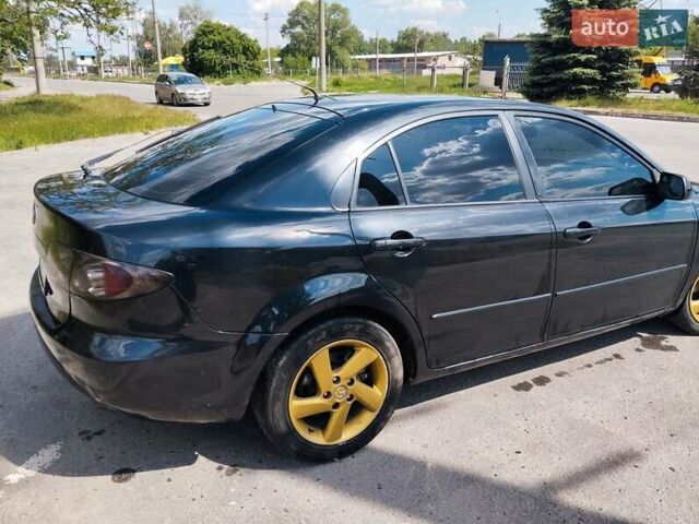 Чорний Мазда 6, об'ємом двигуна 2 л та пробігом 316 тис. км за 4700 $, фото 7 на Automoto.ua