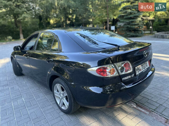 Черный Мазда 6, объемом двигателя 1.8 л и пробегом 230 тыс. км за 3999 $, фото 30 на Automoto.ua