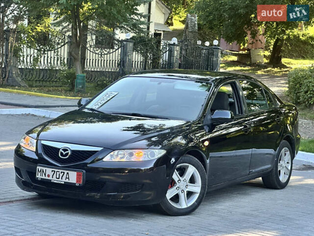 Черный Мазда 6, объемом двигателя 1.8 л и пробегом 230 тыс. км за 3999 $, фото 21 на Automoto.ua