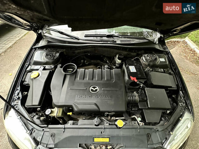Черный Мазда 6, объемом двигателя 1.8 л и пробегом 230 тыс. км за 3650 $, фото 40 на Automoto.ua