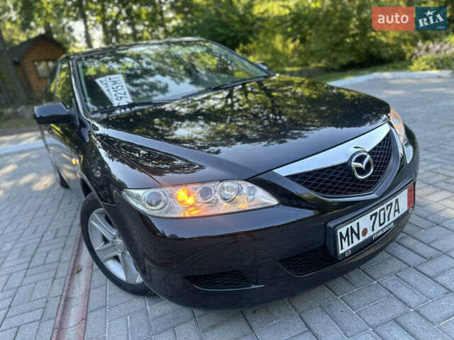 Черный Мазда 6, объемом двигателя 1.8 л и пробегом 230 тыс. км за 3999 $, фото 17 на Automoto.ua