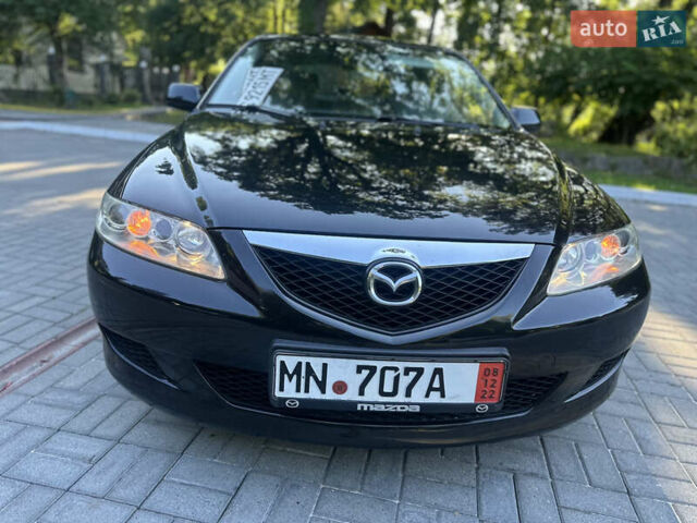 Черный Мазда 6, объемом двигателя 1.8 л и пробегом 230 тыс. км за 3999 $, фото 15 на Automoto.ua