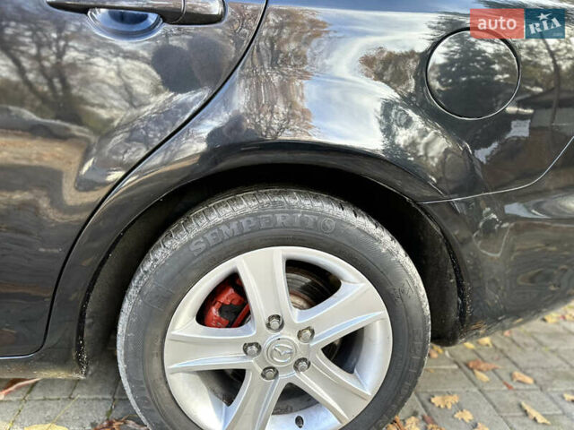 Черный Мазда 6, объемом двигателя 1.8 л и пробегом 230 тыс. км за 3650 $, фото 11 на Automoto.ua