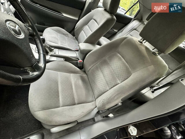 Черный Мазда 6, объемом двигателя 1.8 л и пробегом 230 тыс. км за 3650 $, фото 28 на Automoto.ua