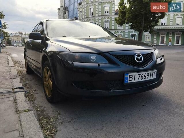 Чорний Мазда 6, об'ємом двигуна 2 л та пробігом 316 тис. км за 4700 $, фото 11 на Automoto.ua