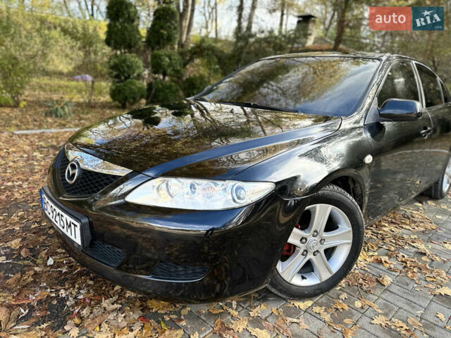 Черный Мазда 6, объемом двигателя 1.8 л и пробегом 230 тыс. км за 3650 $, фото 6 на Automoto.ua