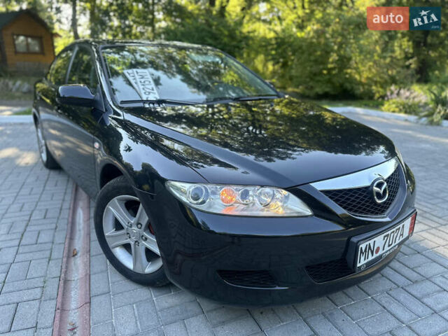 Черный Мазда 6, объемом двигателя 1.8 л и пробегом 230 тыс. км за 3999 $, фото 9 на Automoto.ua