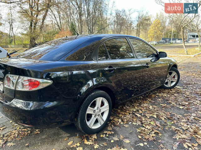 Черный Мазда 6, объемом двигателя 1.8 л и пробегом 230 тыс. км за 3650 $, фото 10 на Automoto.ua