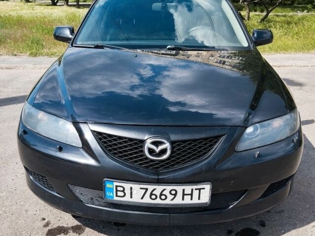 Чорний Мазда 6, об'ємом двигуна 2 л та пробігом 320 тис. км за 4700 $, фото 4 на Automoto.ua