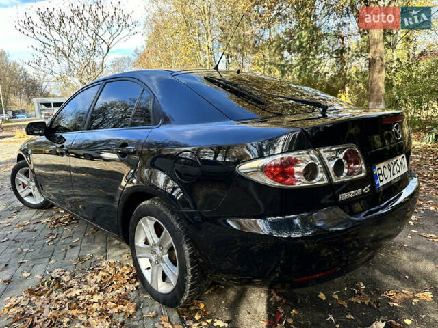 Черный Мазда 6, объемом двигателя 1.8 л и пробегом 230 тыс. км за 3650 $, фото 3 на Automoto.ua